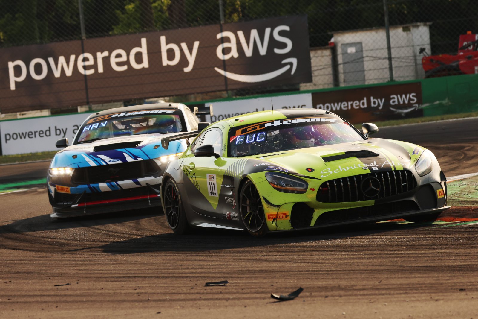 F&ouml;rderer and Fuchs keep their cool to win a chaotic opening Monza race